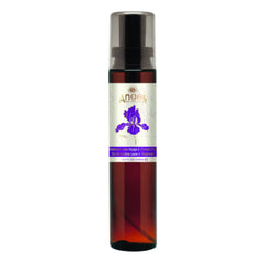 Glass leave-in treatment bottle with silver pump top and purple floral label