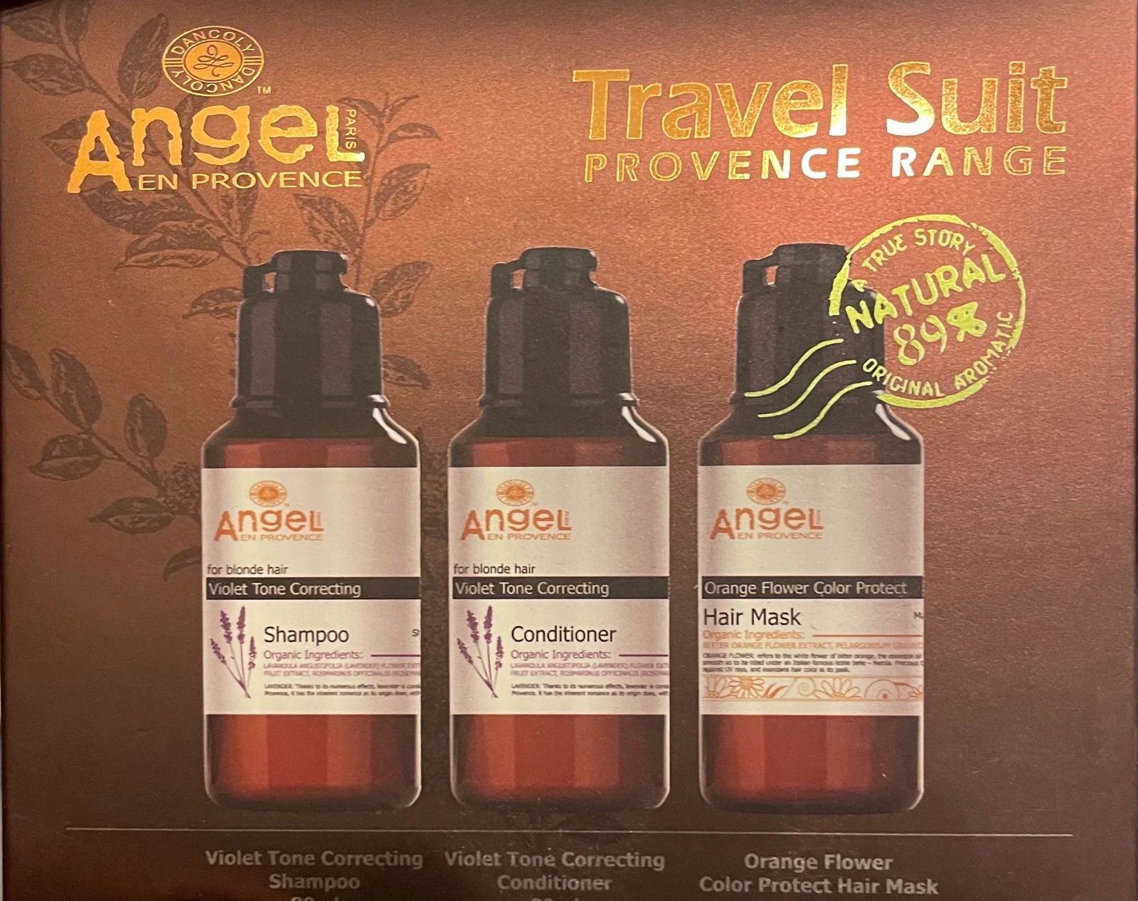 Tone-correcting travel skincare trio with three bottles: shampoo, conditioner, hair mask