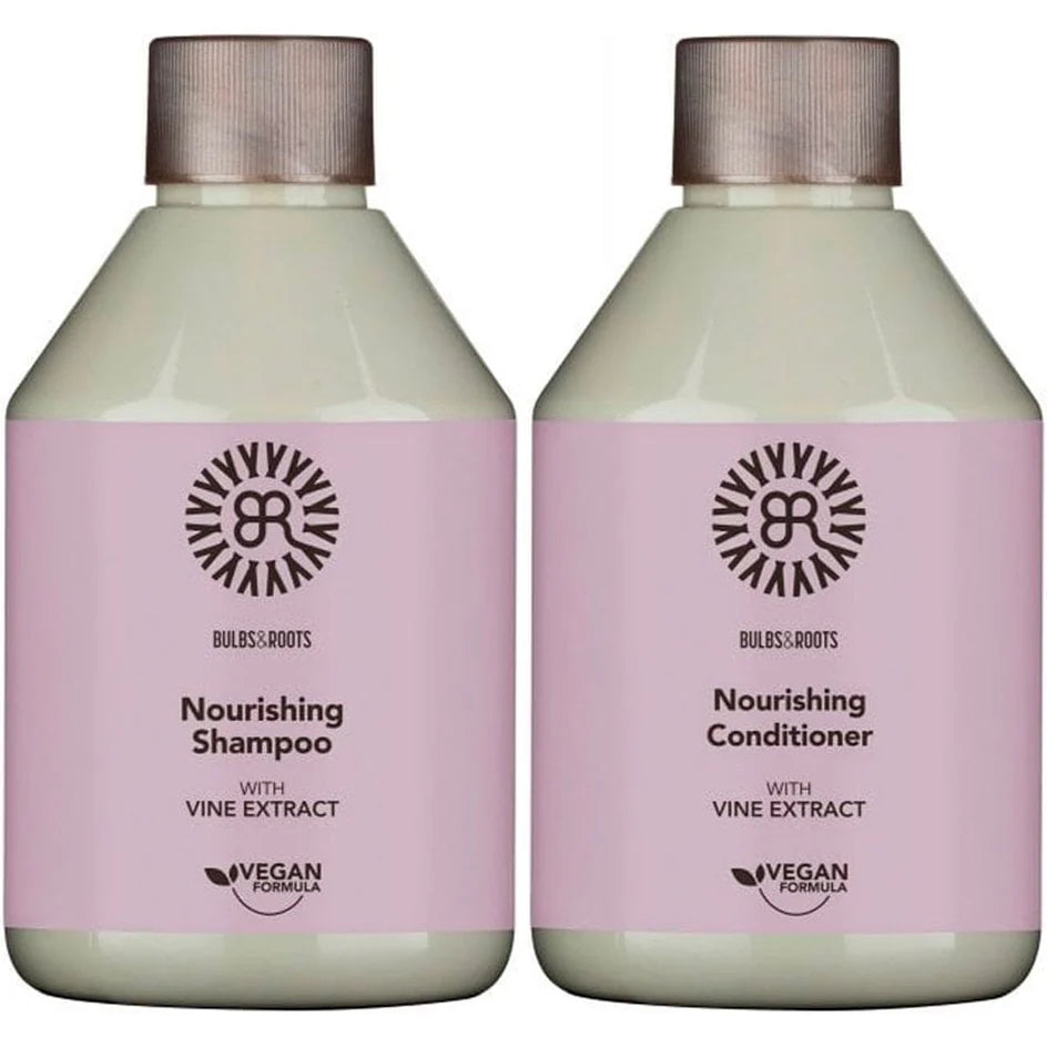 Nourishing shampoo and conditioner bottles with vine extract, pink labels, beige caps.
