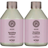 Nourishing shampoo and conditioner bottles with vine extract, pink labels, beige caps.