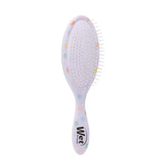 Hair detangling brush showing lavender bristle tips along the oval pad