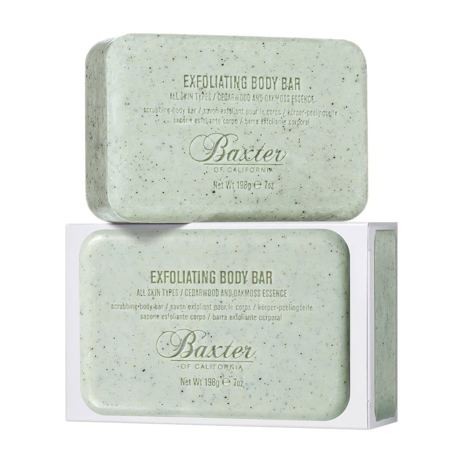 Exfoliating body soap bar, pale green speckled, Baxter logo on wrapped bars