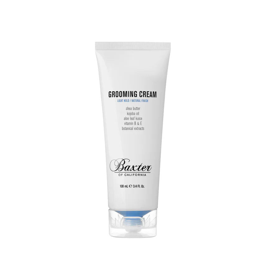 Grooming cream tube, white with flip-top cap; Baxter logo on front