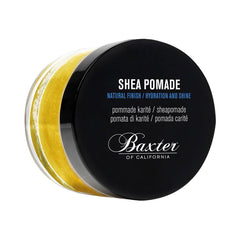 Shea pomade jar with black lid and open yellow product