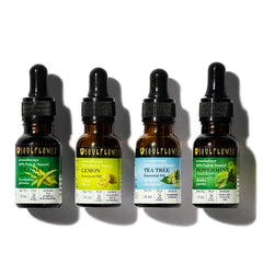 Essential oil bottles set, four 15 ml bottles with black droppers.