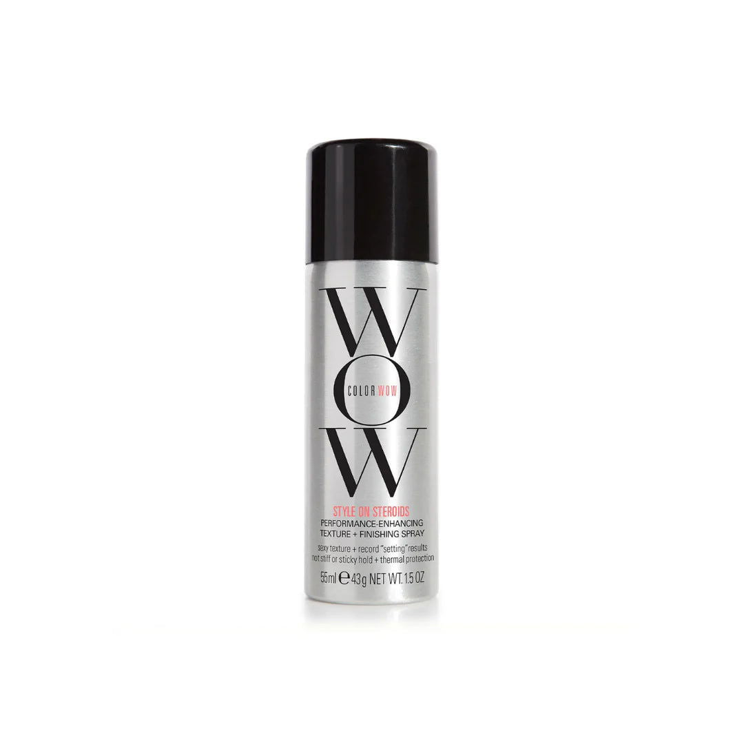 Travel size hair texturising spray bottle with black cap, clear/white label.