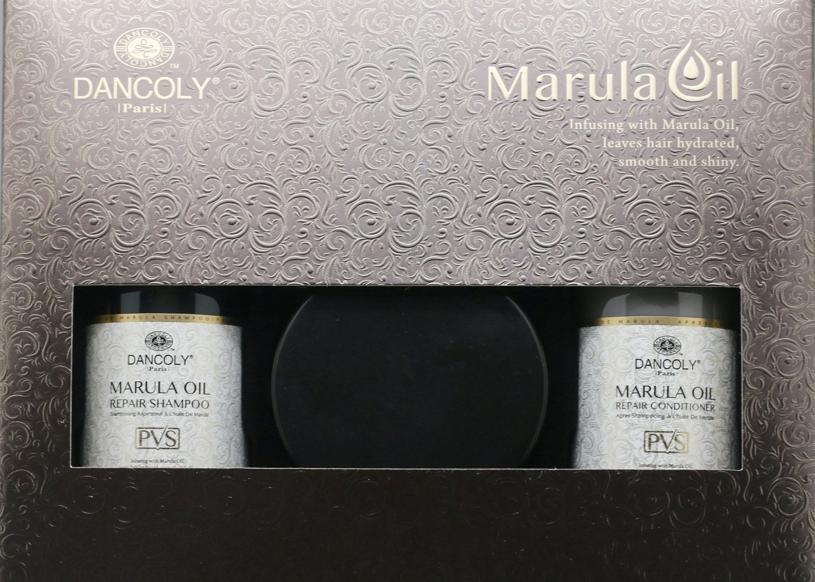 Marula Oil hair care trio gift set with three labeled boxes: shampoo, conditioner, mask