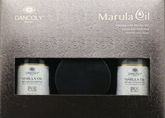 Marula Oil hair care trio gift set with three labeled boxes: shampoo, conditioner, mask