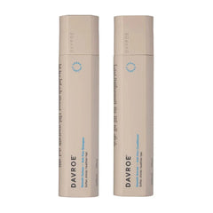 Davroe anti-frizz shampoo and conditioner bundle, two beige bottles with blue label