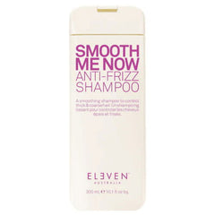 Eleven Australia Smooth Me Now anti-frizz shampoo bottle, white with purple label.