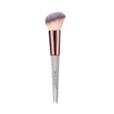 Angled blusher brush with soft purple bristles and rose-gold ferrule