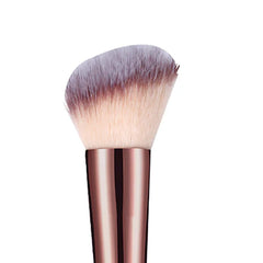 Angled blusher brush with full rounded head and purple-beige bristles