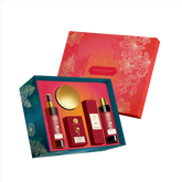 Body care gift set packaging with patterned red and teal outer boxes