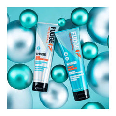 Fudge Xpander whip conditioner tubes, turquoise tubes shown side by side