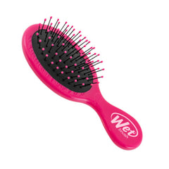 Pink mini detangling hair brush with oval cushion pad and pin bristles