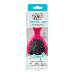 Wet Brush mini detangler packaging with pink brush and detangle graphic