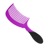 Purple detangling comb with black handle and rows of flexible teeth