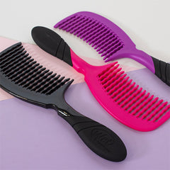 Detangling combs with purple, pink, and black handles and finger-friendly bristles