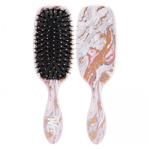 Hair brush with marble handle and black bristle pad, two-sided view