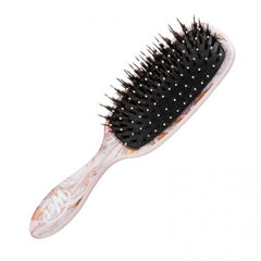 Hair brush with marble handle and black bristles, angled side view