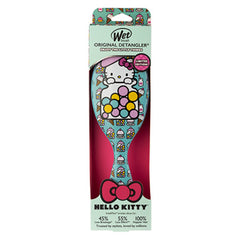 Hello Kitty original detangler brush package with blue patterned brush inside