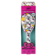 Hello Kitty detangling hair brush retail box with character graphics and text.