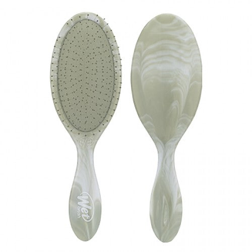 Green and white detangling hair brush with oval cushion pins