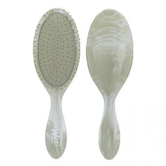 Green and white detangling hair brush with oval cushion pins