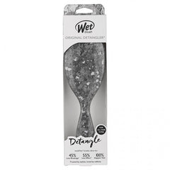 Wet detangle brush box with gray speckled handle and diamond-shaped head