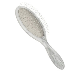 Wet Brush detangling brush with grey bristle pad on matte marble handle