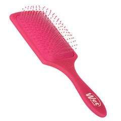 Pink detangling hair brush with wide paddle head and Wet logo on handle