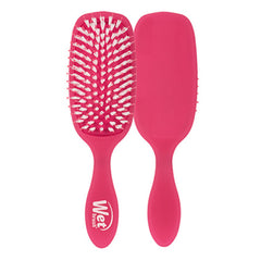 Pink Wet detangler hair brush with white bristles, oval paddle and contoured handle