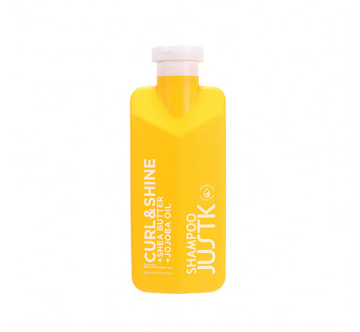 Yellow shampoo bottle with pink cap, JUSTK Curl & Shine Shea Butter & Jojoba Oil