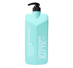 Mint hair conditioner bottle with black pump and vertical label text