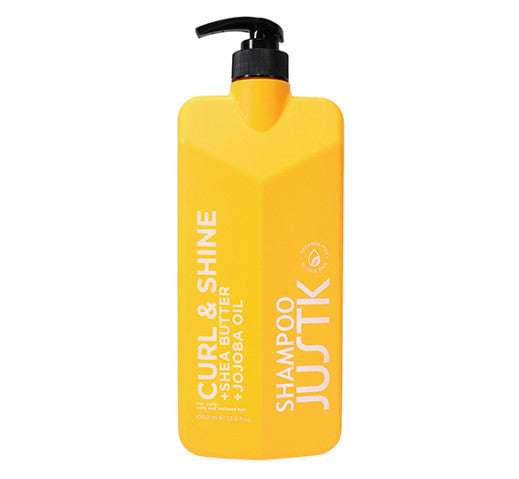 JUSTK Curl & Shine shampoo bottle with black pump, yellow bottle