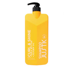 JUSTK Curl & Shine shampoo bottle with black pump, yellow bottle