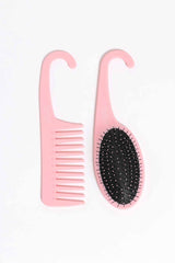 Dusty pink hair de-knot comb and oval brush with bristle pad
