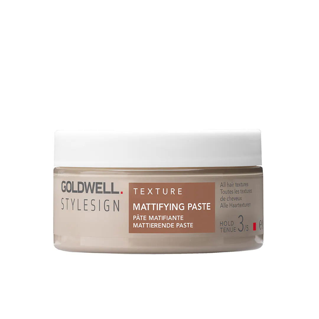 Goldwell StyleSign texture mattifying paste jar, white lid over beige cream