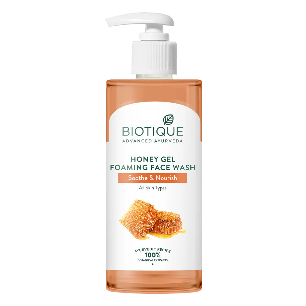 Biotique honey gel foaming face wash bottle with pump, amber-orange liquid container