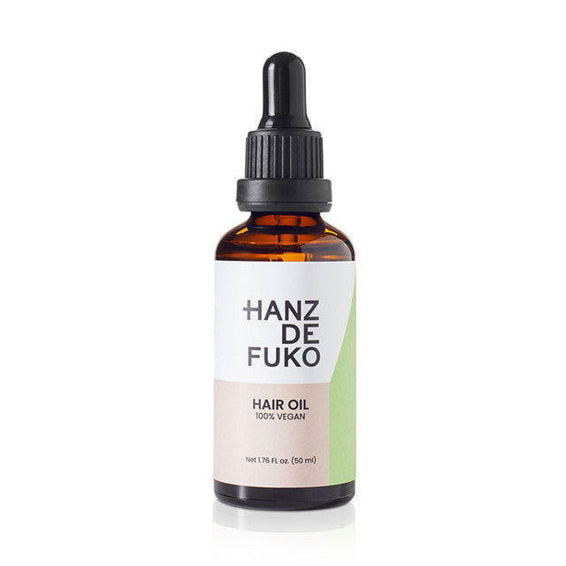 Hanz de Fuko hair oil bottle with dropper, amber glass and black cap