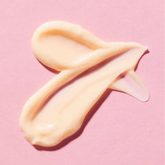 Vitamin C gel cream swatch in thick pale peach on smooth surface
