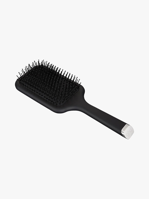Paddle hair brush with black cushioned base and short bristle pad, black handle