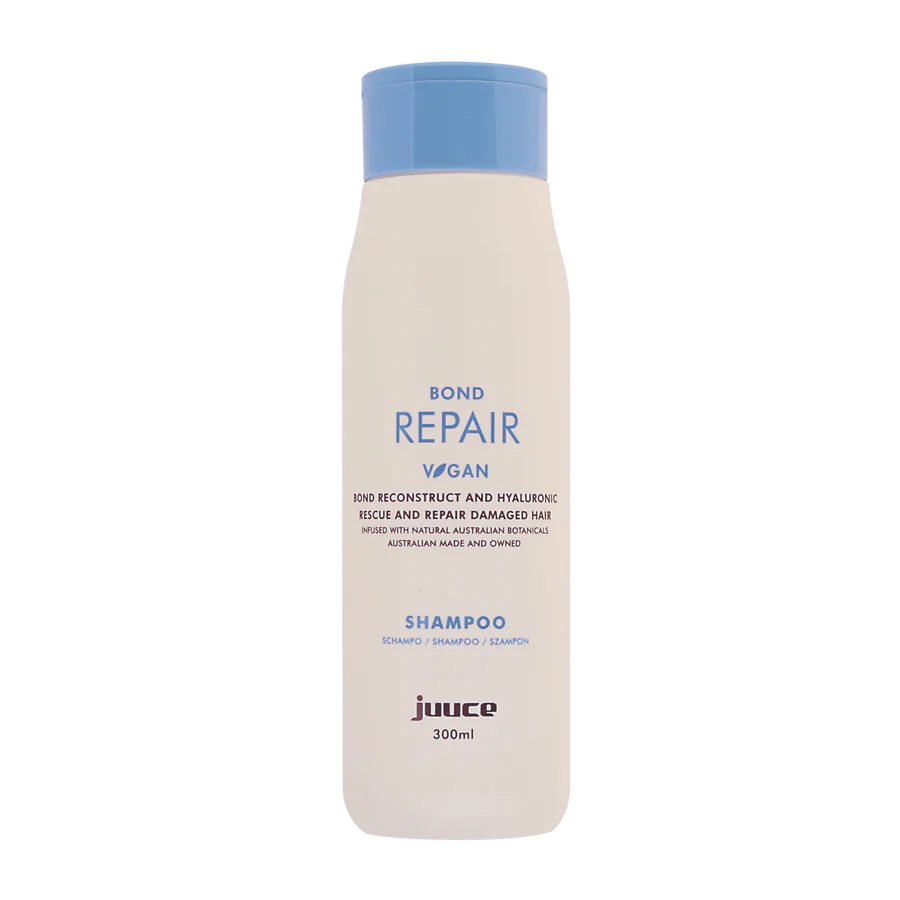 JUUCE bond repair shampoo bottle, beige with blue cap, 300 ml