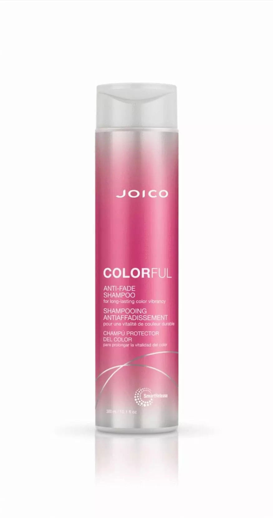 Joico colorful anti-fade shampoo bottle, clear body with pink label and white cap