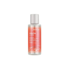 Joico YouthLock shampoo bottle with white cap, transparent body and orange label