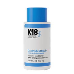 K18 Damage Shield protective conditioner bottle, 250 ml, blue cap.