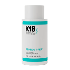 K18 Peptide Prep detox shampoo bottle, front view, white with turquoise band