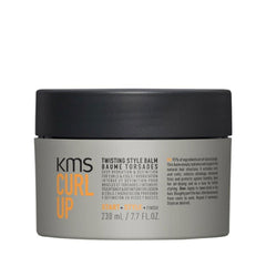 Hair twisting style balm jar, black lid and gray container with KMS Curl Up label