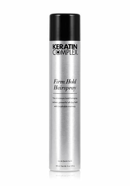 Keratin Complex Firm Hold hairspray bottle, black cap, silver canister.