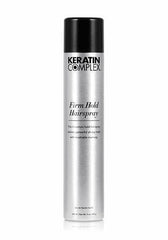 Keratin Complex Firm Hold hairspray bottle, black cap, silver canister.